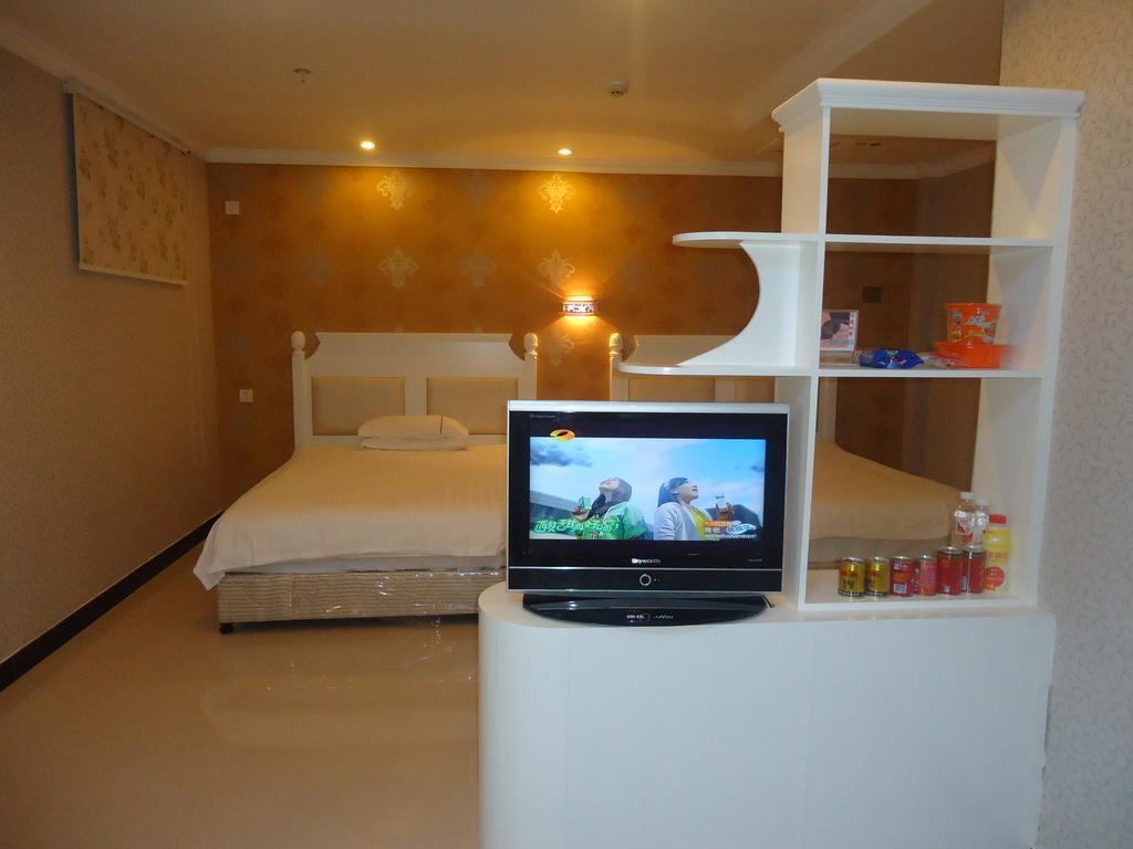 Omeiga Business Hotel Nghĩa Ô Phòng bức ảnh