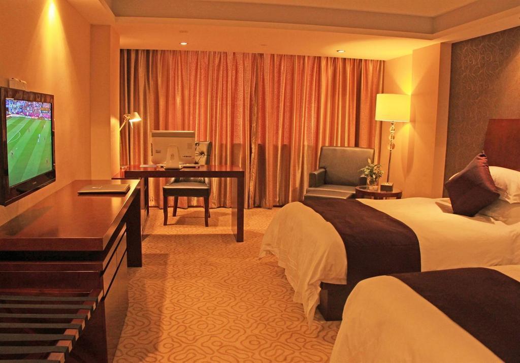 Omeiga Business Hotel Nghĩa Ô Phòng bức ảnh
