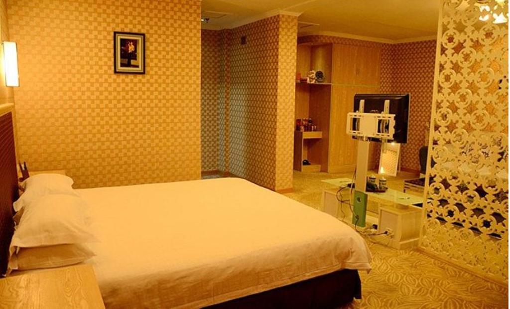 Omeiga Business Hotel Nghĩa Ô Phòng bức ảnh