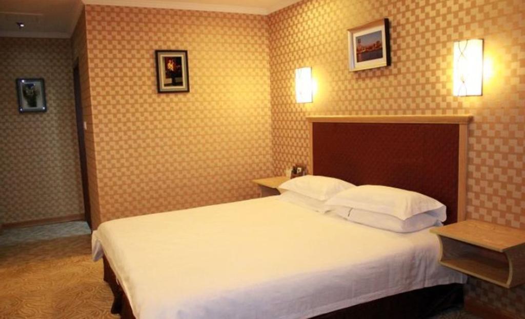 Omeiga Business Hotel Nghĩa Ô Phòng bức ảnh