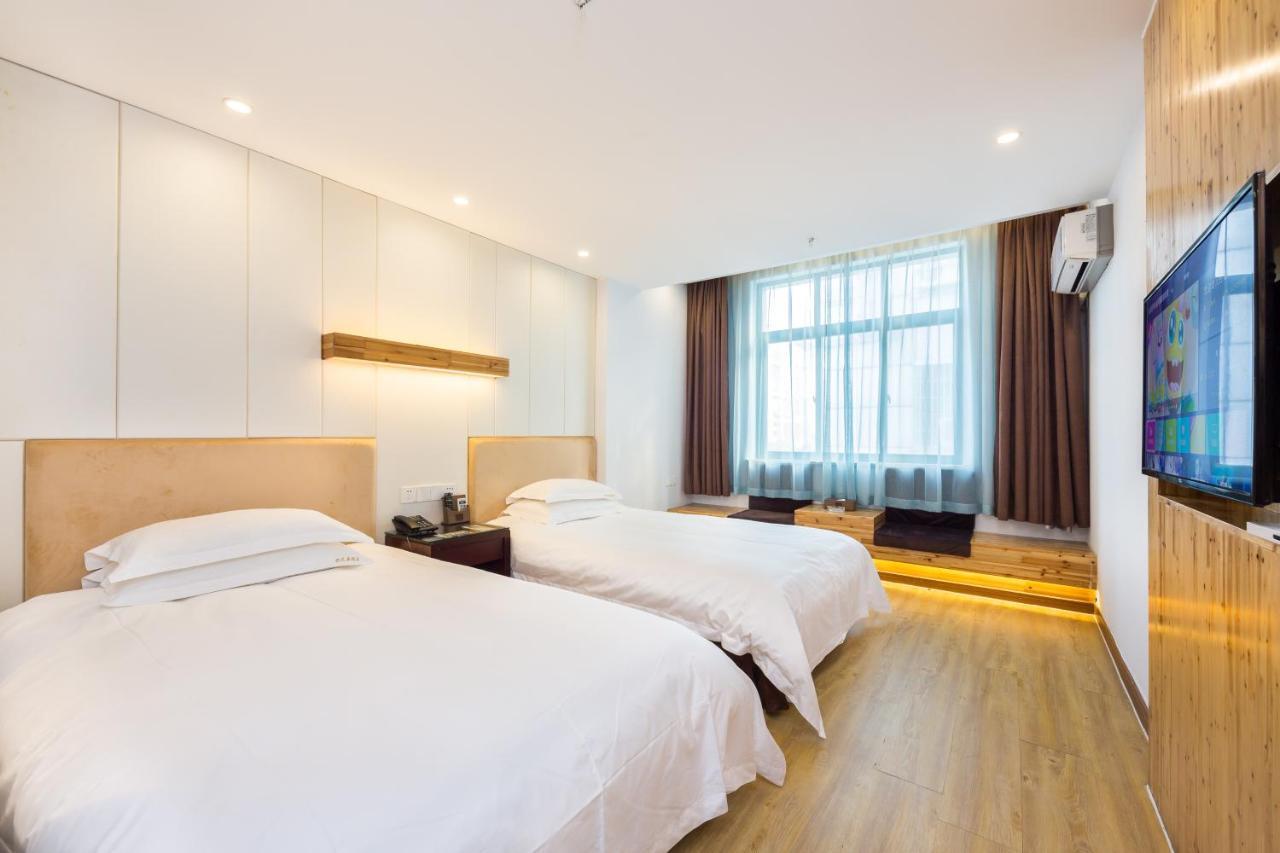 Omeiga Business Hotel Nghĩa Ô Ngoại thất bức ảnh