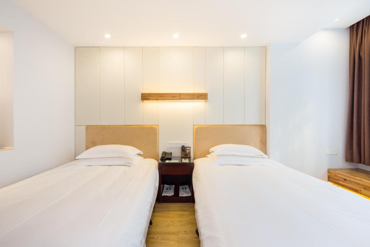 Omeiga Business Hotel Nghĩa Ô Ngoại thất bức ảnh